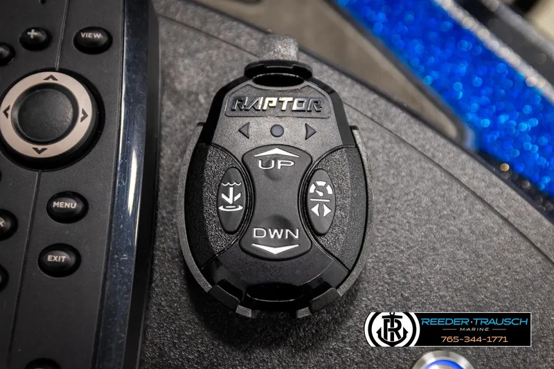 Slide: The Image of 2024 Bass Tracker NitroZ20 control panel with Raptor remote and marine branding. - 50