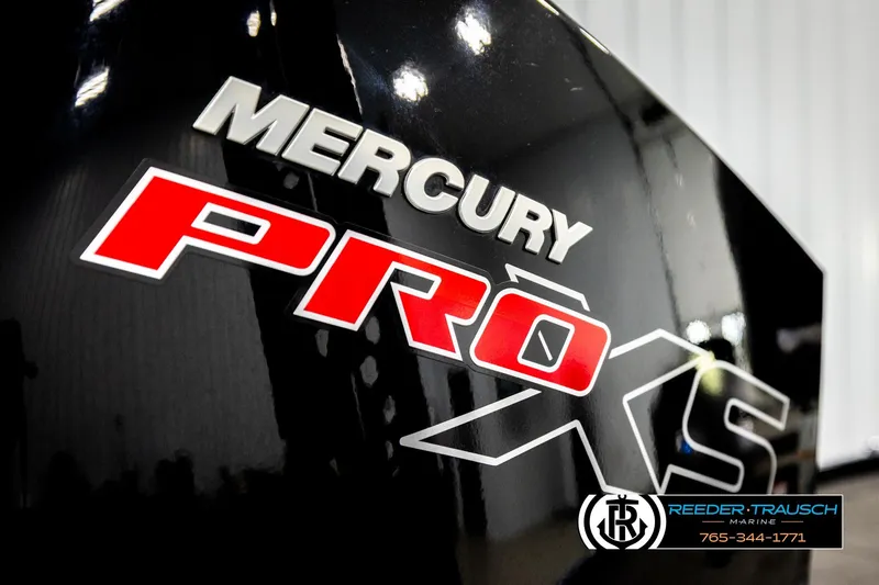 Slide: The Image of 2024 Bass Tracker NitroZ20 with Mercury Pro XS engine branding. - 58