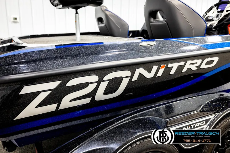 Slide: The Image of 2024 Bass Tracker Nitro Z20 boat with sleek design and branding. - 66