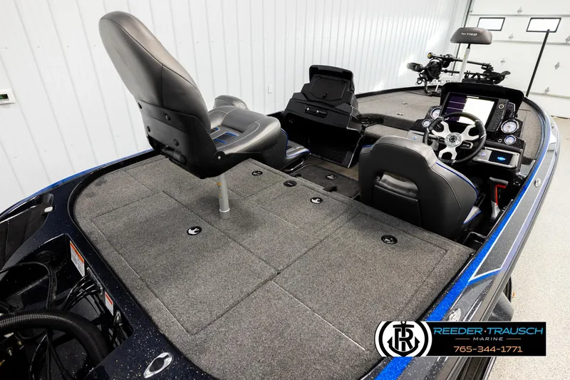 Slide: The Image of 2024 Bass Tracker NitroZ20 boat interior with seating and control panel. - 11