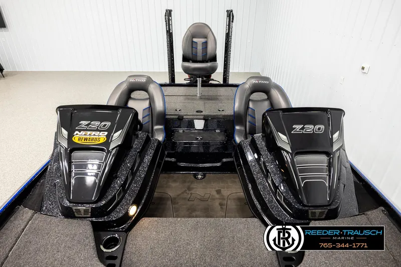 Slide: The Image of 2024 Bass Tracker Nitro Z20 boat interior with dual seats and sleek design. - 16