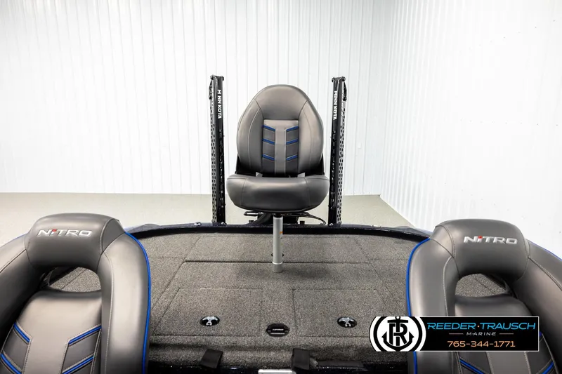 Slide: The Image of 2024 Bass Tracker Nitro Z20 boat interior with Minn Kota accessories and branded seating. - 17