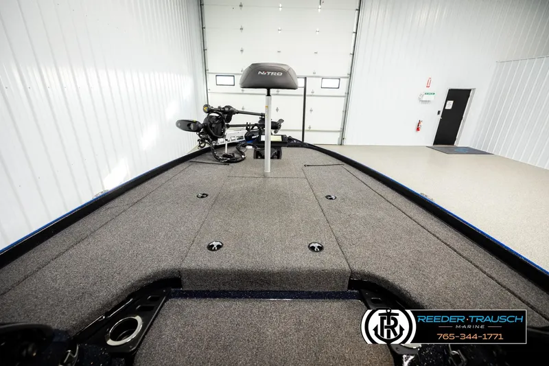 Slide: The Image of 2024 Bass Tracker NitroZ20 boat interior with spacious deck and fishing seat. - 20
