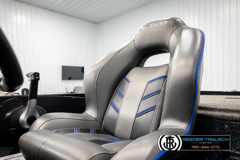 Slide: The Image of 2024 Bass Tracker NitroZ20 boat seat with sleek design and blue accents. - 41