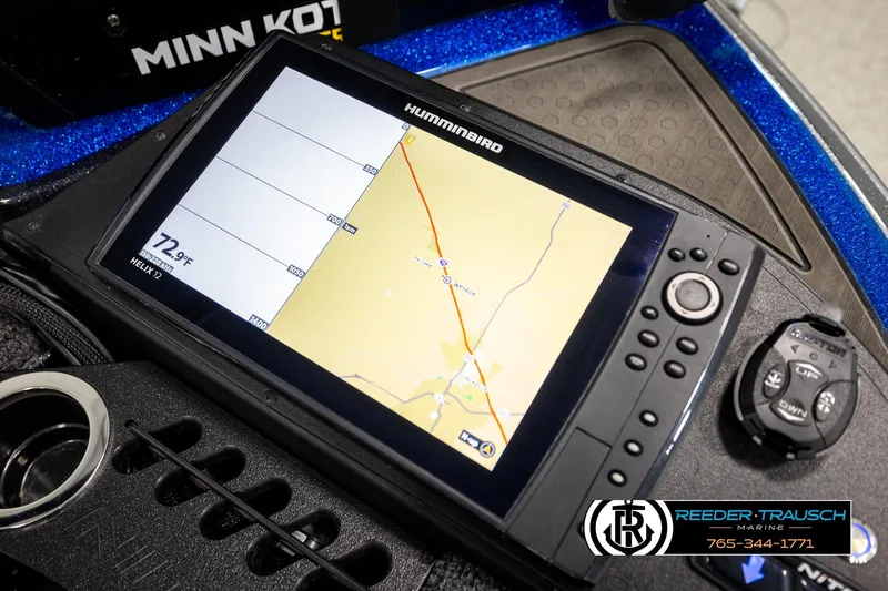 Slide: The Image of 2024 Bass Tracker Nitro Z20 with Humminbird GPS display and Minn Kota controls. - 49