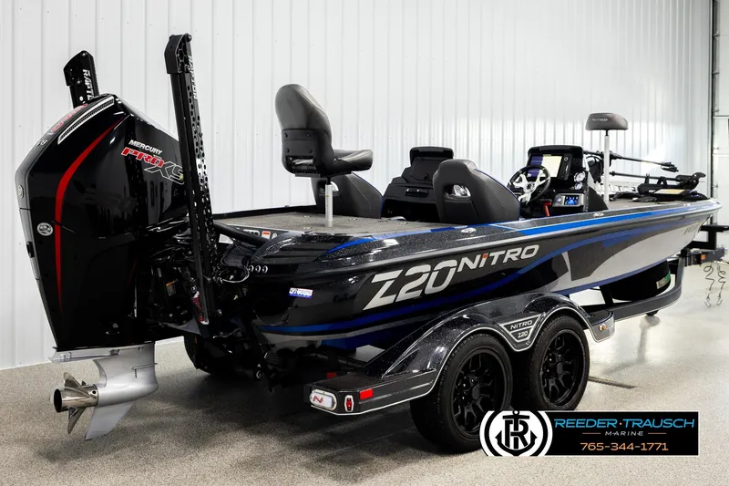 Slide: The Image of 2024 Bass Tracker Nitro Z20 boat with Mercury Pro XS engine in showroom. - 5