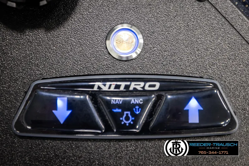 Slide: The Image of 2024 Bass Tracker Nitro Z20 dashboard with navigation controls and Reeder-Trausch Marine branding. - 51