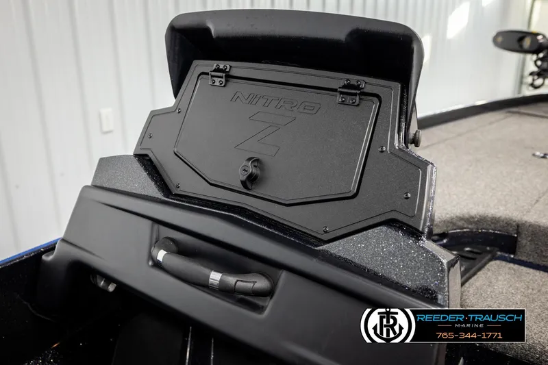 Slide: The Image of 2024 Bass Tracker Nitro Z20 boat dashboard with Reeder-Trausch Marine branding. - 55
