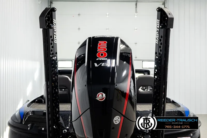 Slide: The Image of 2024 Bass Tracker Nitro Z20 boat with powerful V8 engine in a showroom. - 6