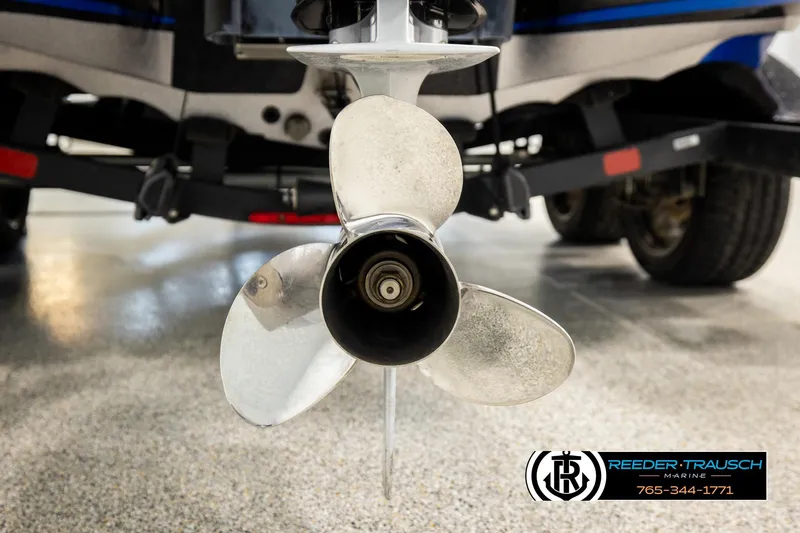 Slide: The Image of 2024 Bass Tracker NitroZ20 boat propeller close-up in showroom setting. - 60