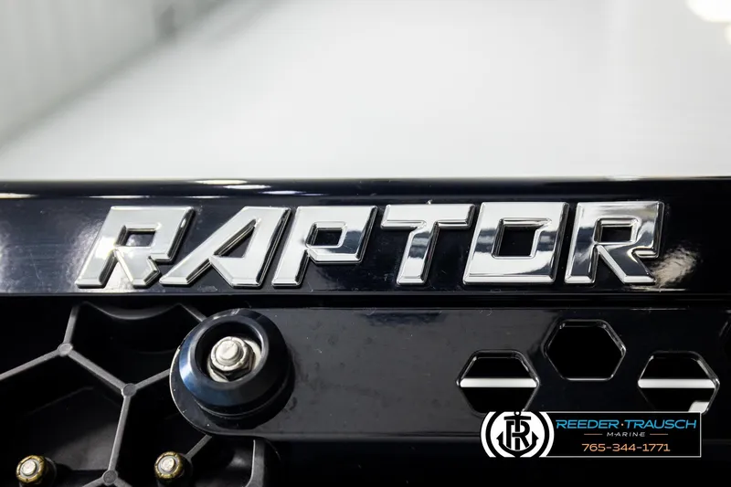 Slide: The Image of Close-up of "Raptor" logo on 2024 Bass Tracker NitroZ20 boat component. - 61