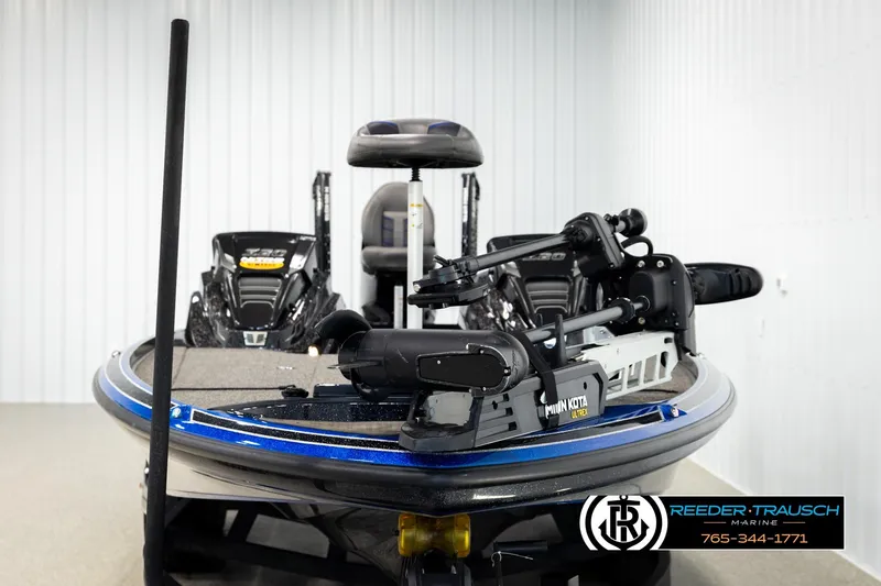 Slide: The Image of 2024 Bass Tracker NitroZ20 boat with Minn Kota motor in showroom. - 7