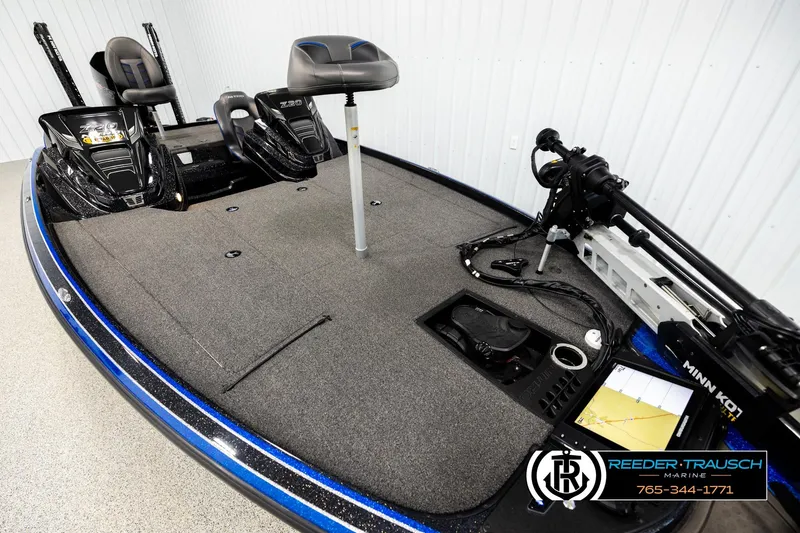 Slide: The Image of 2024 Bass Tracker Nitro Z20 boat interior with fishing seats and equipment. - 8