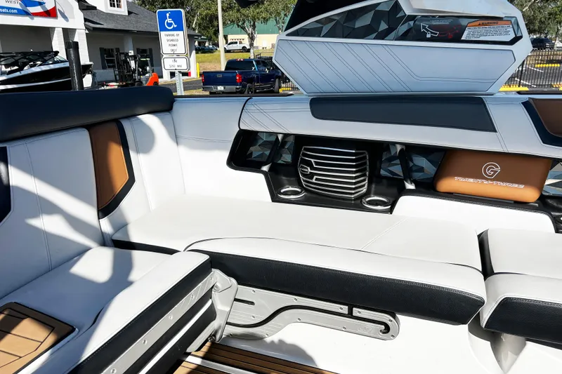 Slide: The Image of 2019 Nautique Super Air Nautique G23 interior with luxurious seating and modern design. - 12