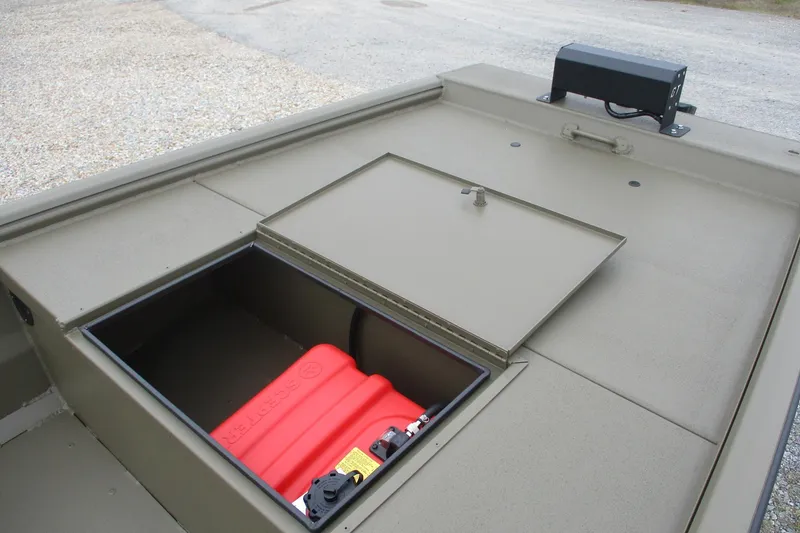 Slide: The Image of 2026 Gator Tail 1748 GATOR boat with open storage compartment and red fuel tank. - 6