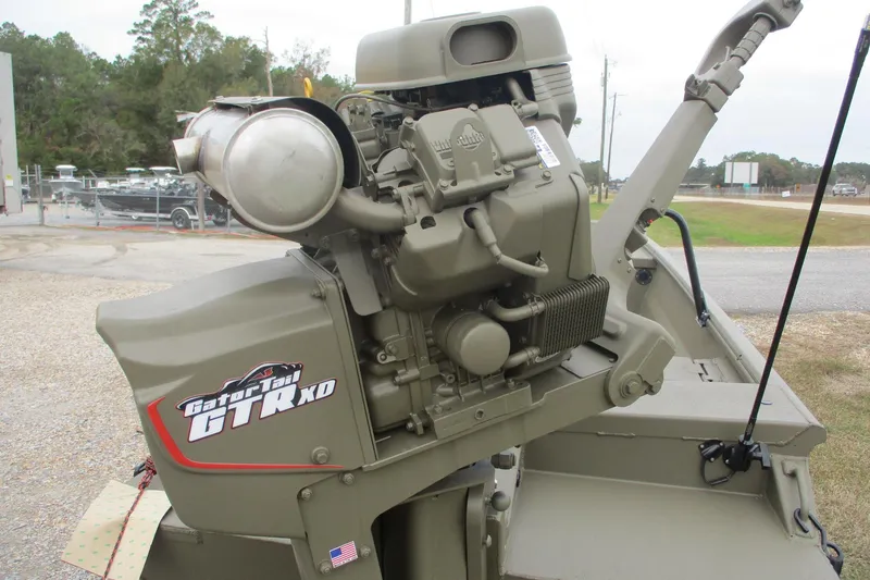 Slide: The Image of 2026 Gator Tail 1748 GATOR boat engine, GTR XD model, in outdoor setting. - 9