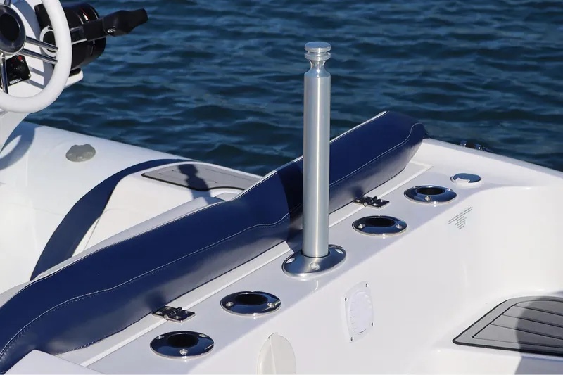 Slide: The Image of Manufacturer Provided Image: Walker Bay Venture 16 boat interior, 2025 model, featuring sleek seating and cup holders. - 13