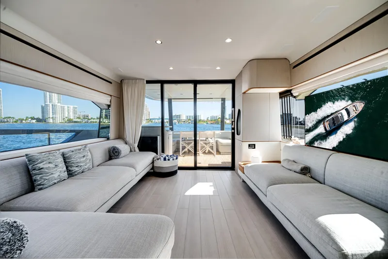 Slide: The Image of Luxurious interior of 2023 Azimut Fly 68 yacht with modern seating and ocean view. - 11