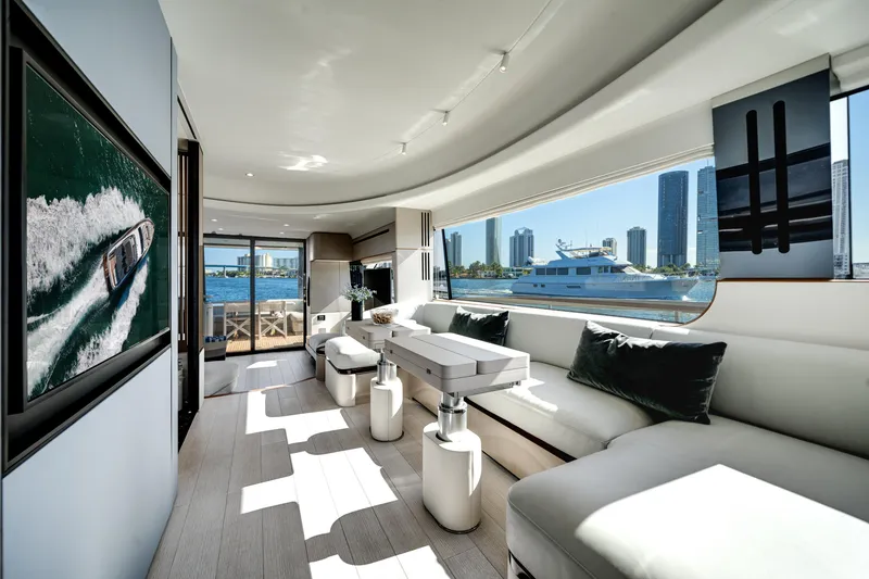 Slide: The Image of Luxurious interior of 2023 Azimut Fly 68 yacht with city skyline view. - 14