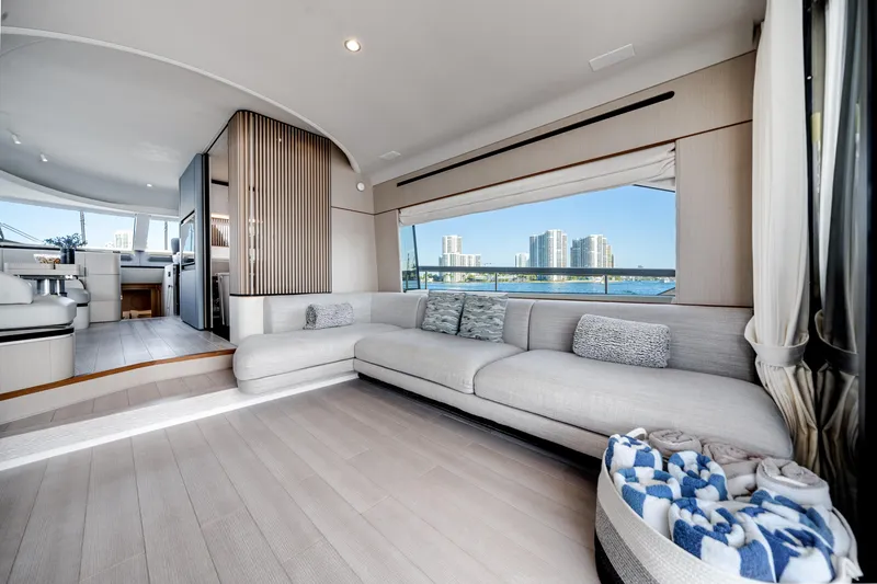 Slide: The Image of Luxurious interior of 2023 Azimut Fly 68 yacht with modern design and waterfront view. - 16
