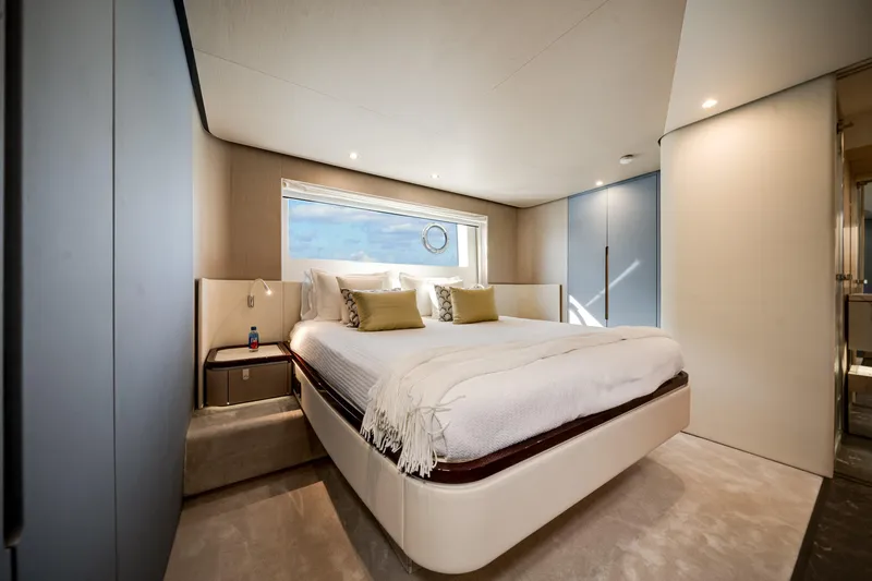 Slide: The Image of Luxurious bedroom interior of 2023 Azimut Fly 68 yacht with modern design and elegant furnishings. - 17