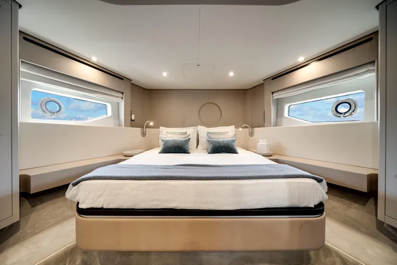 Slide: The Image of Luxurious bedroom interior of 2023 Azimut Fly 68 yacht with modern design and large windows. - 19