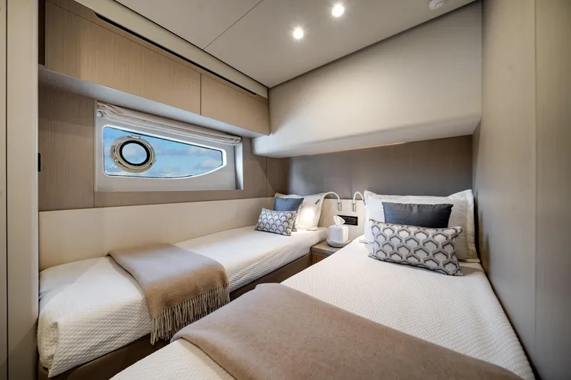 Slide: The Image of Luxurious twin cabin interior of 2023 Azimut Fly 68 yacht with modern decor. - 23