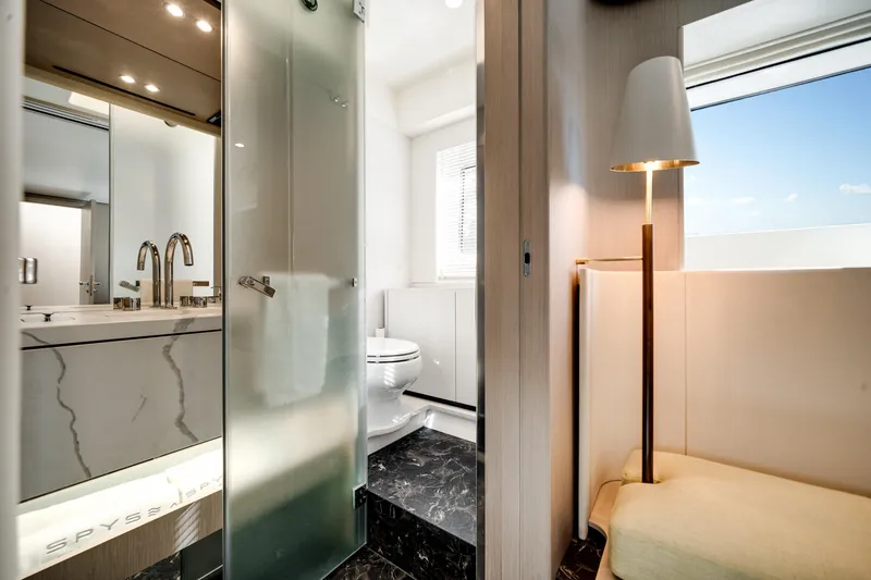 Slide: The Image of Luxurious bathroom interior of 2023 Azimut Fly 68 yacht with modern fixtures and elegant design. - 31