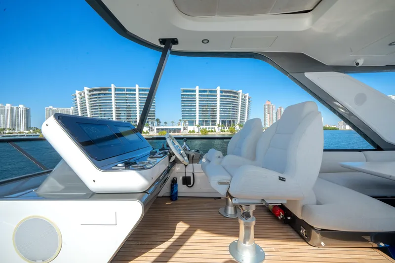 Slide: The Image of Luxurious 2023 Azimut Fly 68 yacht interior with modern helm and plush seating. - 39