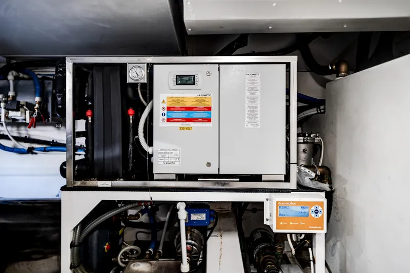 Slide: The Image of Engine room of 2023 Azimut Fly 68 yacht, featuring advanced control systems. - 45