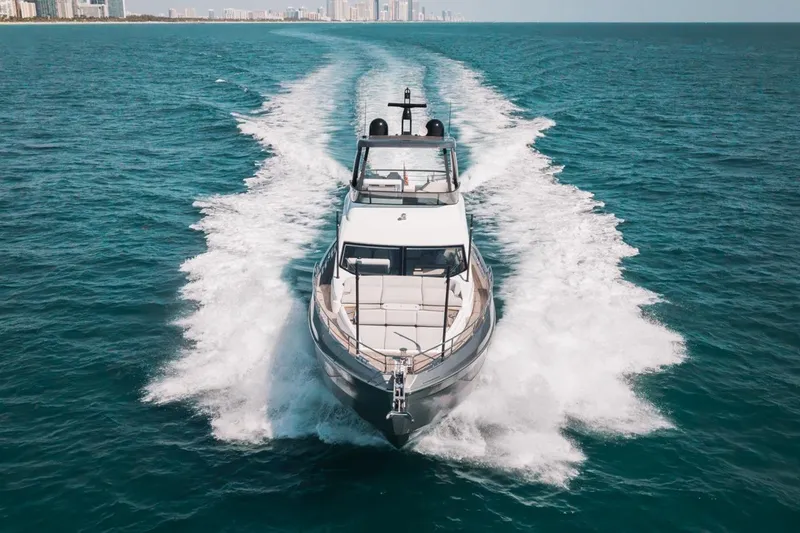 Slide: The Image of 2023 Azimut Fly 68 yacht cruising on open ocean waters. - 60