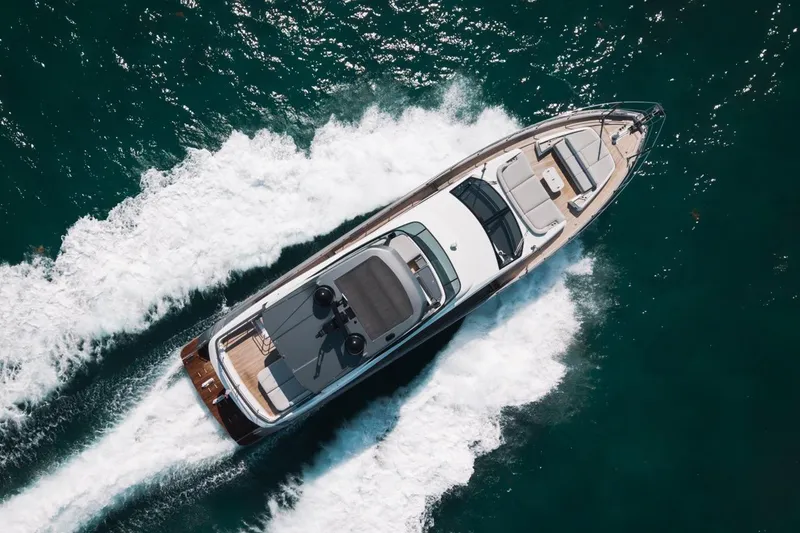Slide: The Image of Aerial view of 2023 Azimut Fly 68 yacht cruising on the ocean. - 63