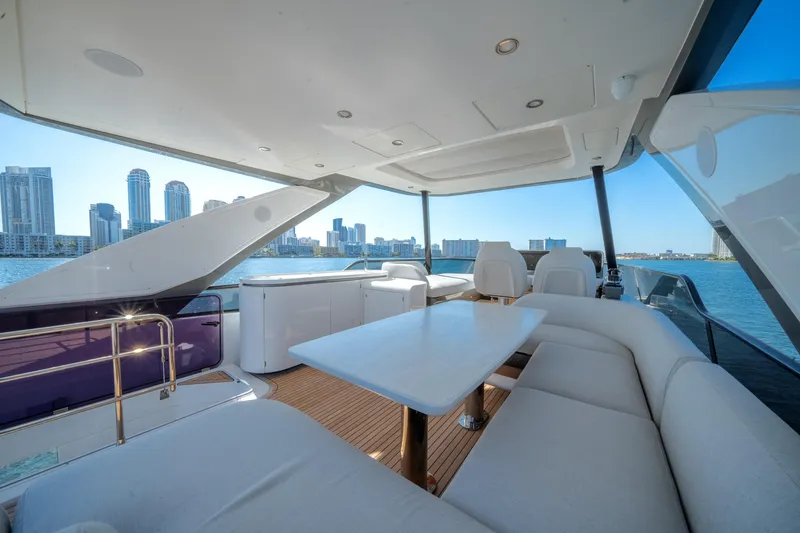 Slide: The Image of Luxurious 2023 Azimut Fly 68 yacht interior with city skyline view. - 8