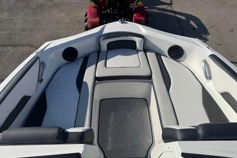 Slide: The Image of 2026 Yamaha Boats SX195 interior with sleek seating and modern design. - 11