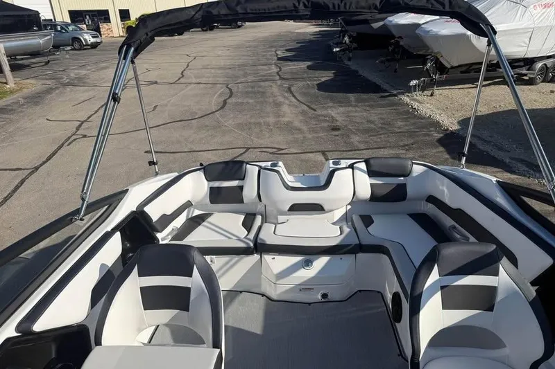 Slide: The Image of 2026 Yamaha Boats SX195 interior with sleek seating and modern design. - 12