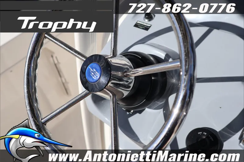 Slide: The Image of Steering wheel of 2026 Bayliner Trophy T22CC boat, featuring Antonietti Marine branding. - 16