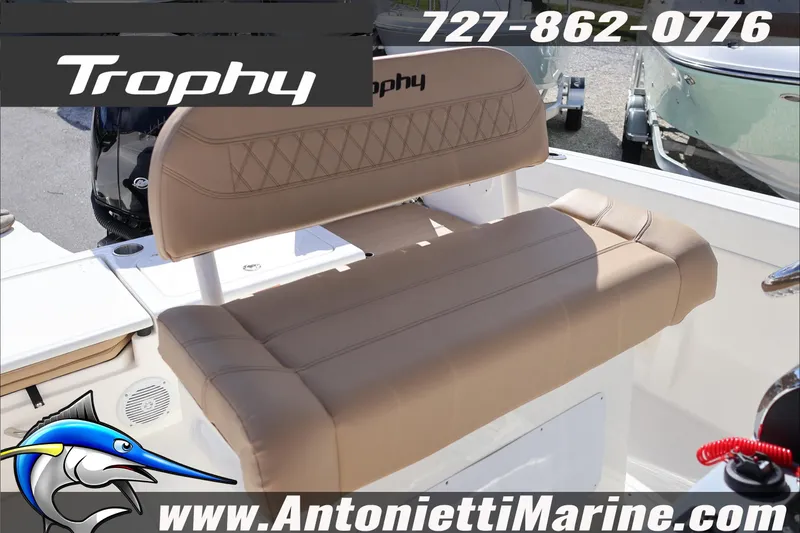 Slide: The Image of 2026 Bayliner Trophy T22CC boat seating with logo and contact details. - 17