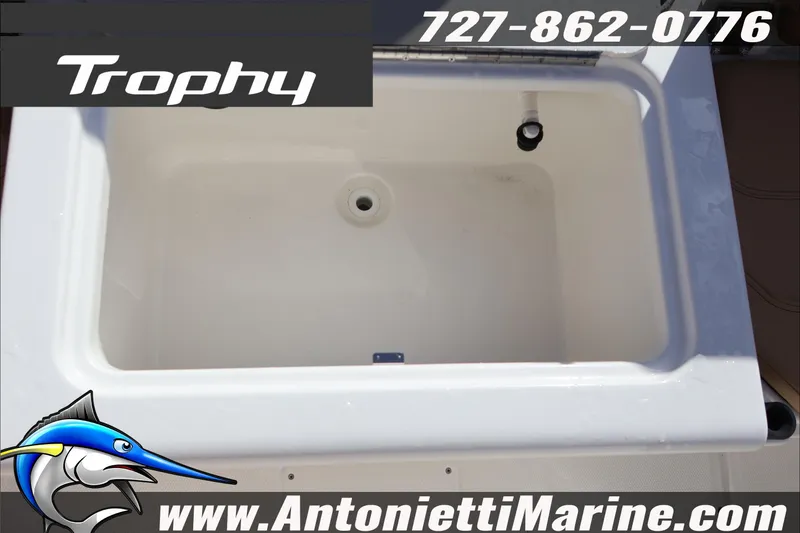 Slide: The Image of 2026 Bayliner Trophy T22CC livewell, Antonietti Marine contact details displayed. - 25