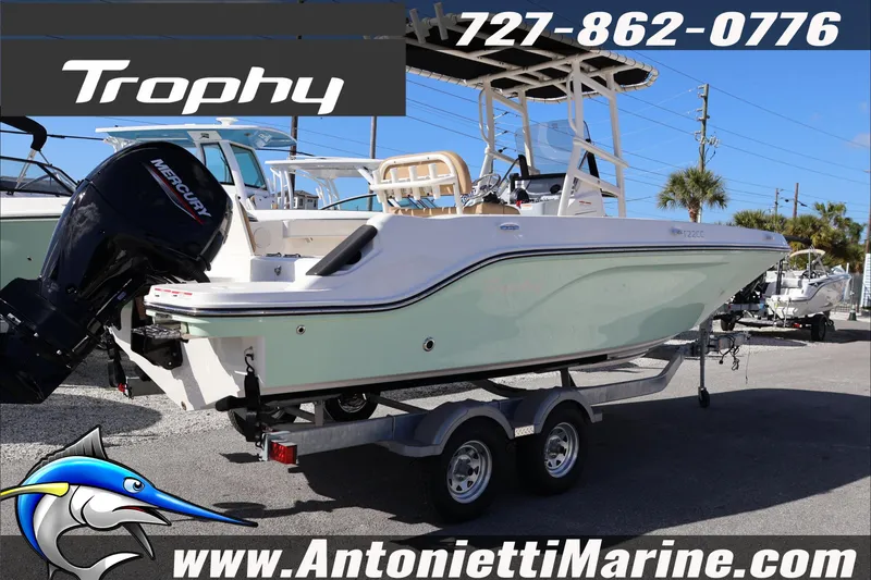 Slide: The Image of 2026 Bayliner Trophy T22CC boat on trailer at Antonietti Marine dealership. - 5