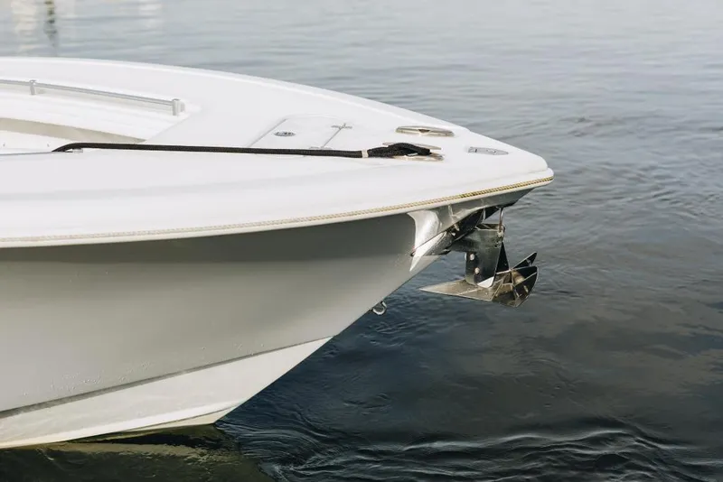Slide: The Image of 2023 Yellowfin 32 Offshore boat bow with anchor in calm water. - 20