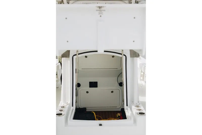 Slide: The Image of 2023 Yellowfin 32 Offshore boat interior storage compartment. - 23