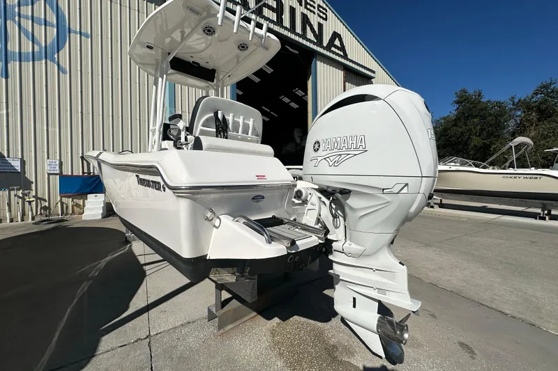 Slide: The Image of 2025 Tidewater 198 CC Adventure boat with Yamaha engine at marina. - 6