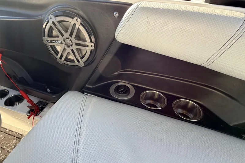 Slide: The Image of Interior of 2015 MasterCraft X20 boat with JL Audio speaker and cup holders. - 15