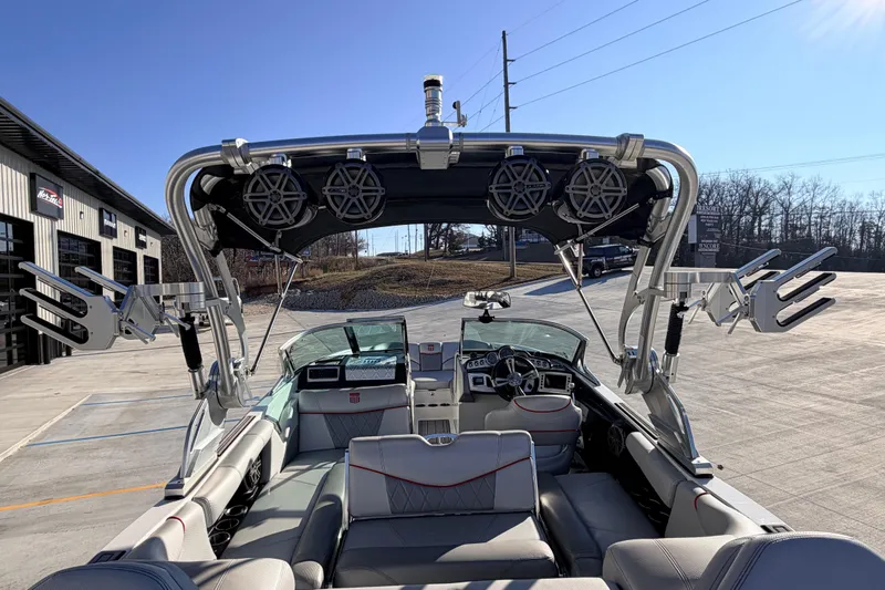 Slide: The Image of 2015 MasterCraft X20 boat interior with speakers and wakeboard racks. - 19