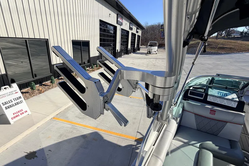 Slide: The Image of 2015 MasterCraft X20 boat with wakeboard rack at dealership. - 21