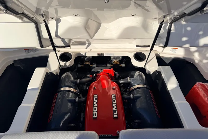 Slide: The Image of 2015 MasterCraft X20 engine compartment with Ilmor engine, open hatch view. - 4