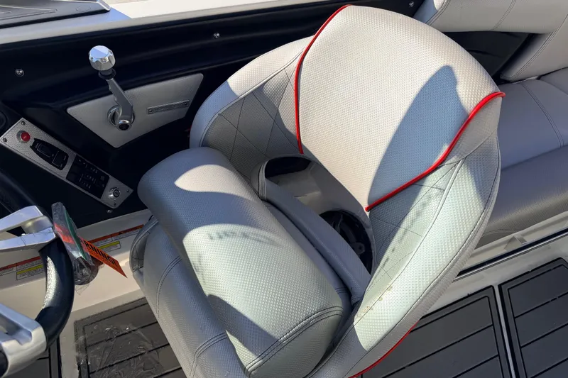 Slide: The Image of Interior of a 2015 MasterCraft X20 boat with gray seat. - 5