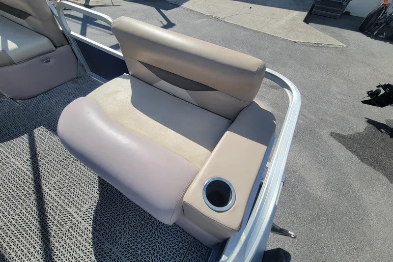 Slide: The Image of 2015 Sun Tracker Party Barge 16 DLX seat with cup holder on deck. - 7