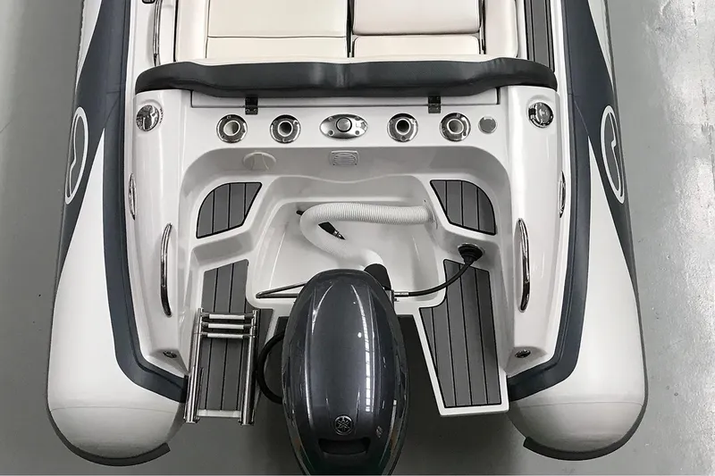 Slide: The Image of Manufacturer Provided Image: Walker Bay Venture 14 boat, 2025 model, featuring sleek design and modern outboard motor. - 19