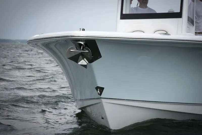 Slide: The Image of 2019 Sea Hunt Gamefish 25 boat with dual Yamaha engines on a trailer. - 4